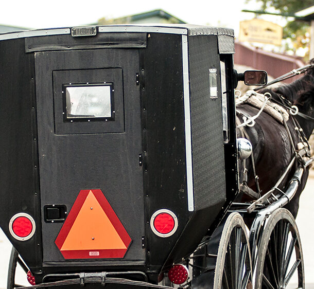 amish buggy with slow moving vehicle sign