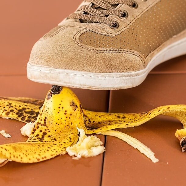 sneaker and banana peel slip and fall image
