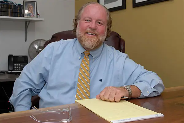 Mike Warren of Counsel