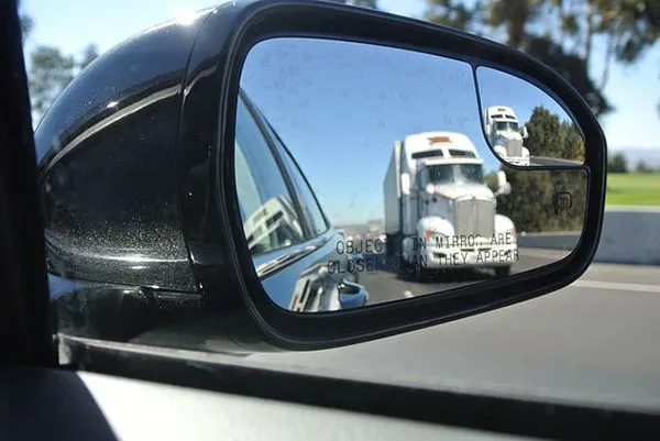 truck in rear view mirror